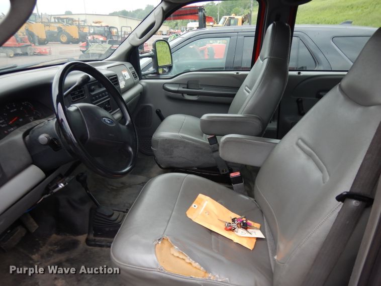 image for item DH5529 2004 Ford F550 Super Duty  Crew Cab utility bed truck