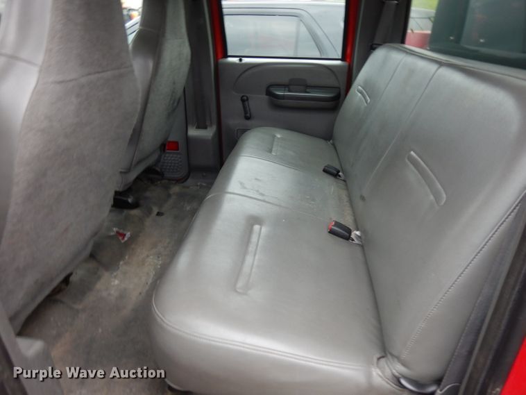 image for item DH5529 2004 Ford F550 Super Duty  Crew Cab utility bed truck