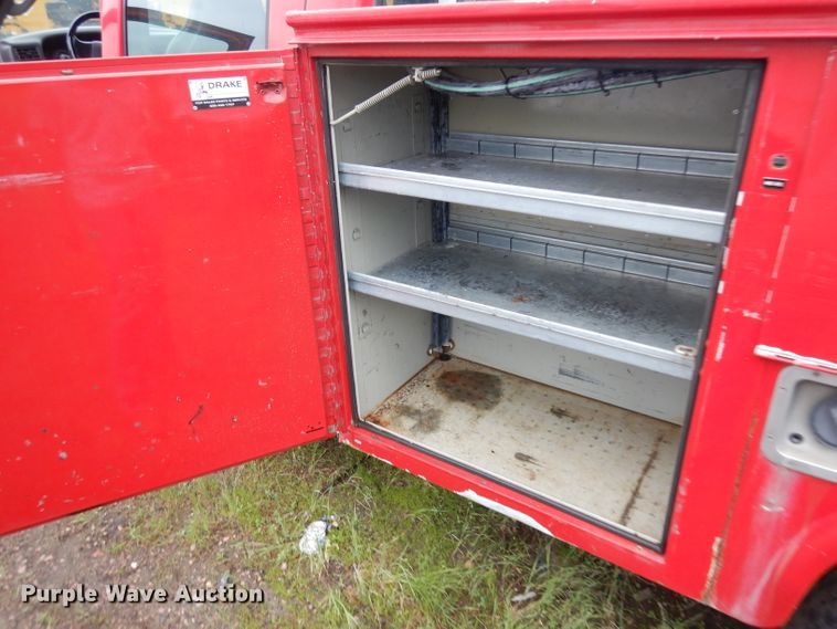 image for item DH5529 2004 Ford F550 Super Duty  Crew Cab utility bed truck