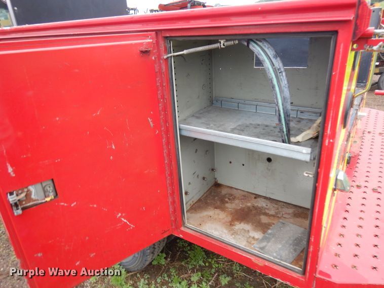 image for item DH5529 2004 Ford F550 Super Duty  Crew Cab utility bed truck