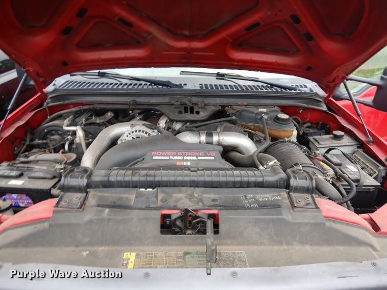 image for item DH5529 2004 Ford F550 Super Duty  Crew Cab utility bed truck