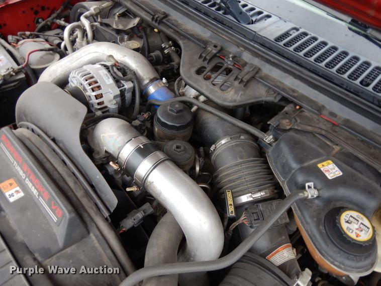 image for item DH5529 2004 Ford F550 Super Duty  Crew Cab utility bed truck