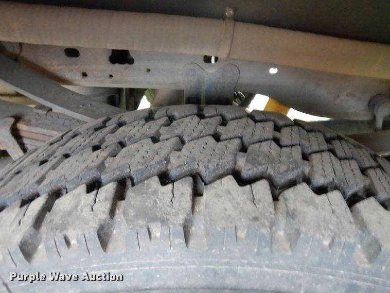 image for item DH5529 2004 Ford F550 Super Duty  Crew Cab utility bed truck