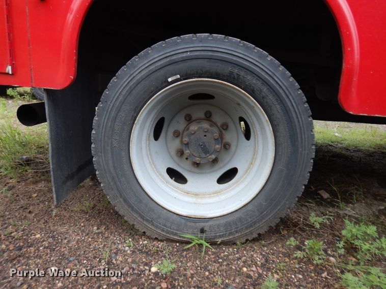 image for item DH5529 2004 Ford F550 Super Duty  Crew Cab utility bed truck