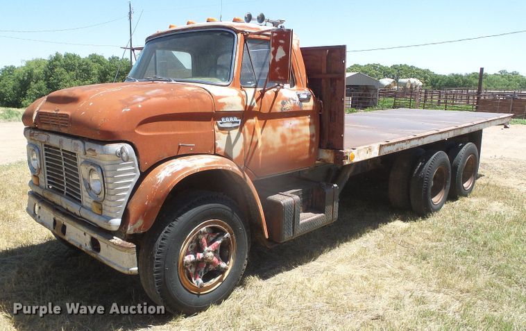 image for item DD0438 1964 Ford N750  dump flatbed truck