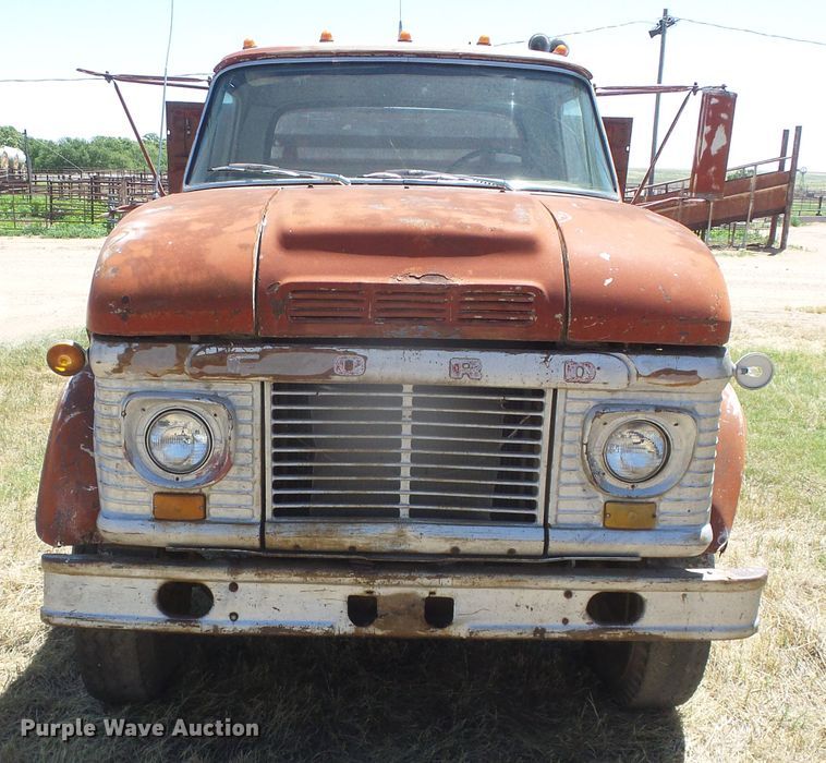 image for item DD0438 1964 Ford N750  dump flatbed truck