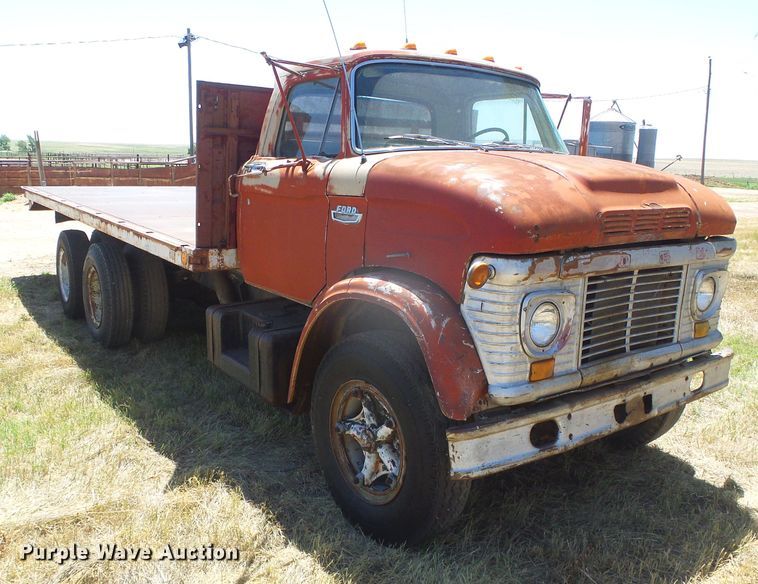 image for item DD0438 1964 Ford N750  dump flatbed truck