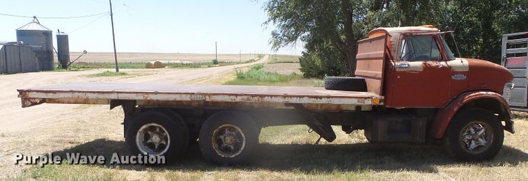 image for item DD0438 1964 Ford N750  dump flatbed truck