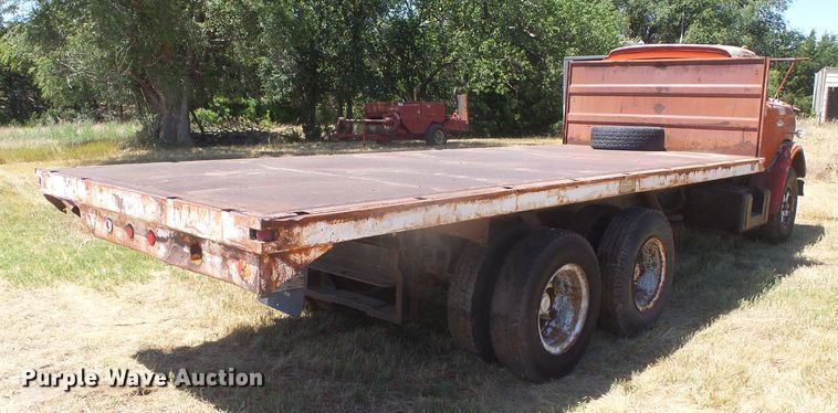 image for item DD0438 1964 Ford N750  dump flatbed truck