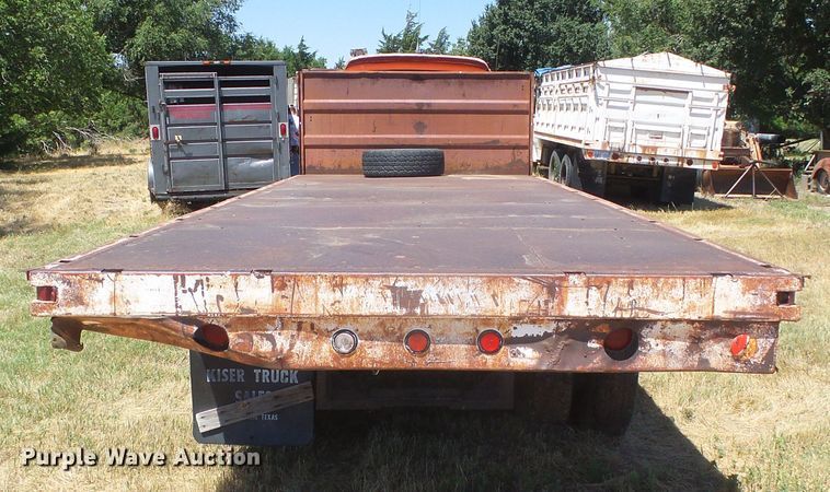 image for item DD0438 1964 Ford N750  dump flatbed truck
