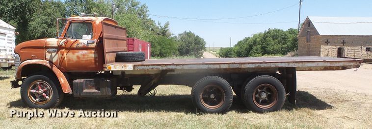 image for item DD0438 1964 Ford N750  dump flatbed truck