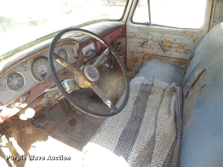 image for item DD0438 1964 Ford N750  dump flatbed truck