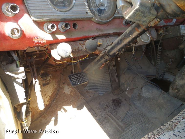 image for item DD0438 1964 Ford N750  dump flatbed truck