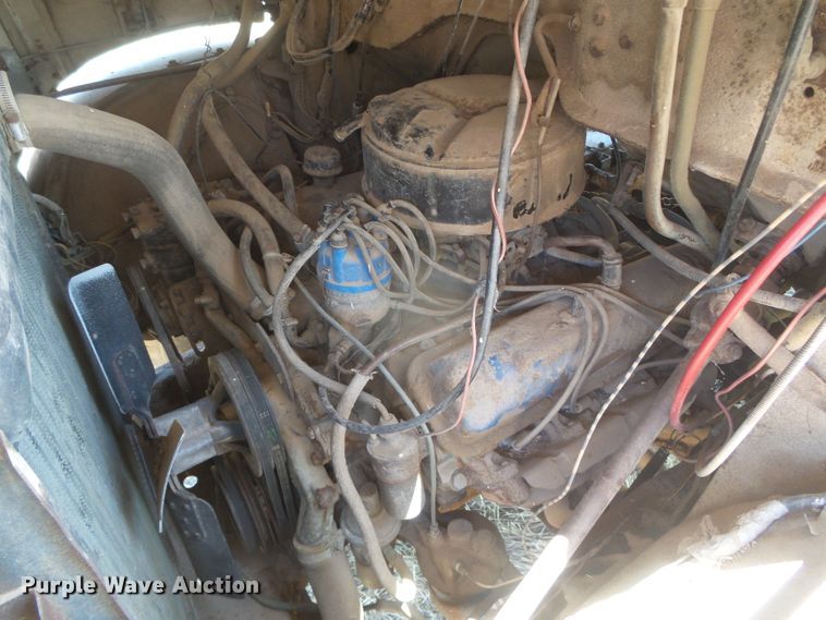 image for item DD0438 1964 Ford N750  dump flatbed truck