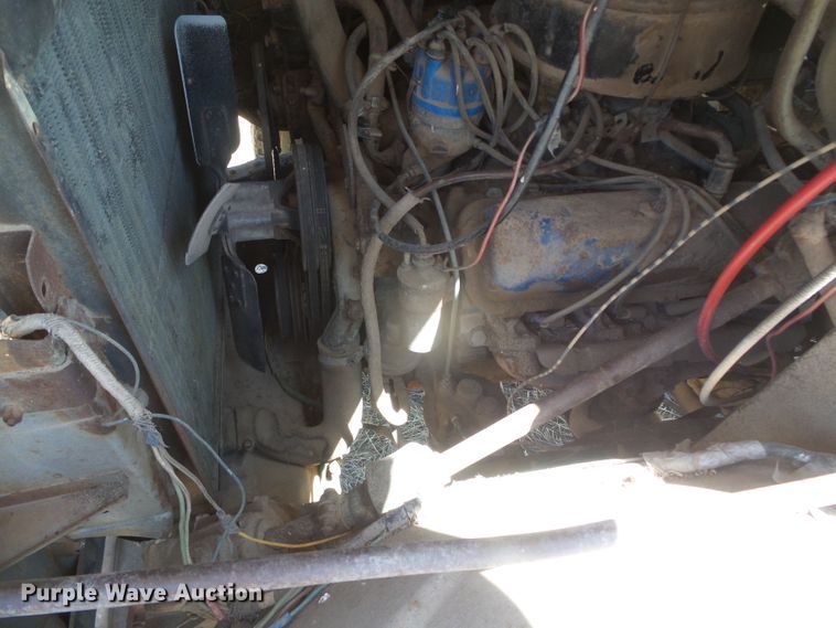 image for item DD0438 1964 Ford N750  dump flatbed truck