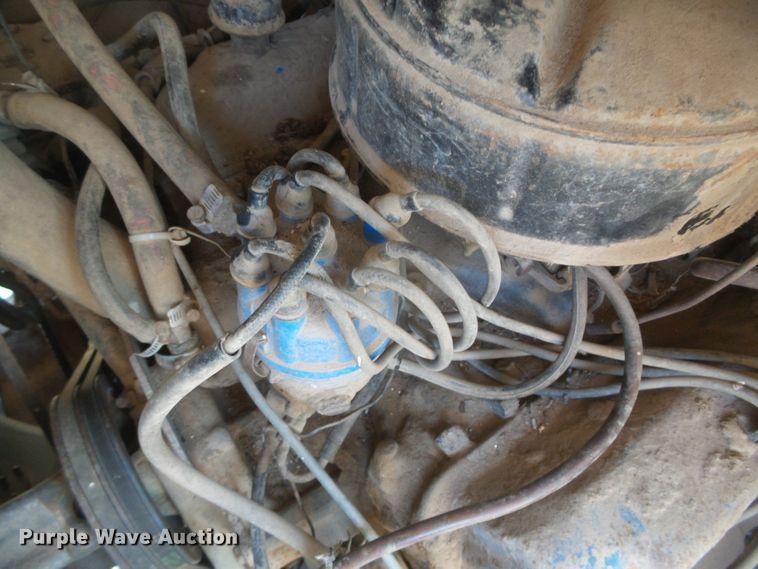 image for item DD0438 1964 Ford N750  dump flatbed truck