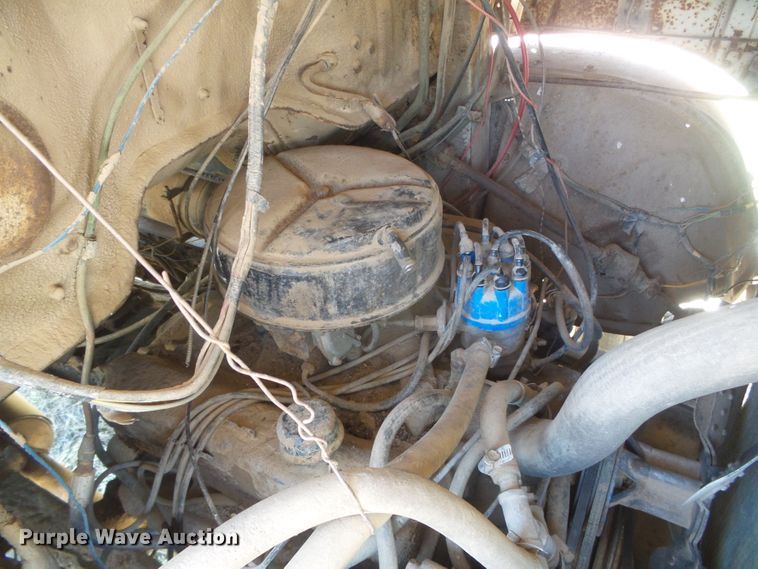 image for item DD0438 1964 Ford N750  dump flatbed truck