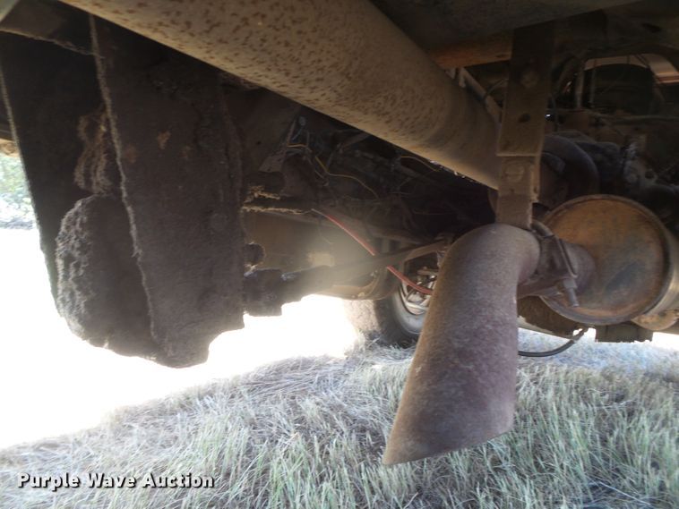 image for item DD0438 1964 Ford N750  dump flatbed truck