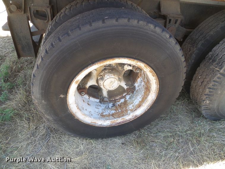 image for item DD0438 1964 Ford N750  dump flatbed truck