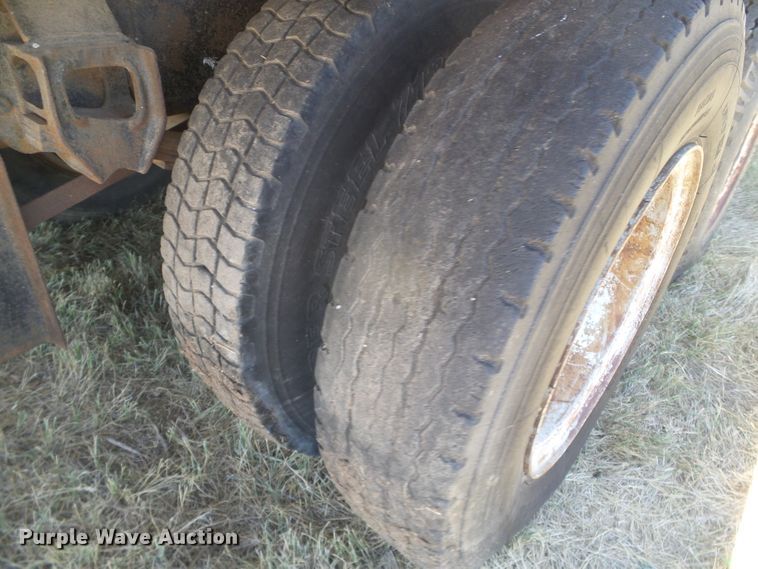 image for item DD0438 1964 Ford N750  dump flatbed truck