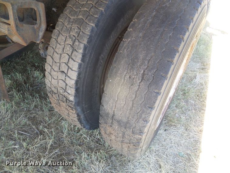 image for item DD0438 1964 Ford N750  dump flatbed truck