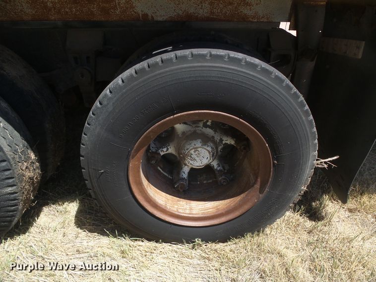 image for item DD0438 1964 Ford N750  dump flatbed truck