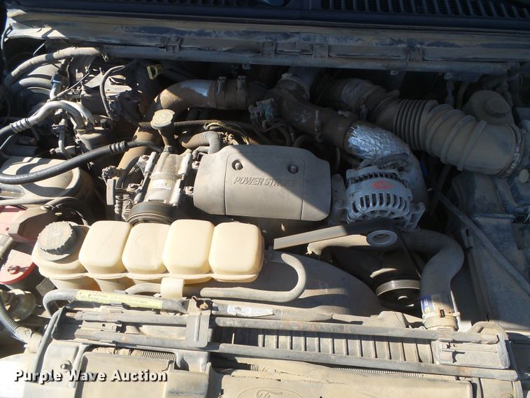 image for item DD0431 2000 Ford F250 Super Duty XLT  SuperCab flatbed pickup truck