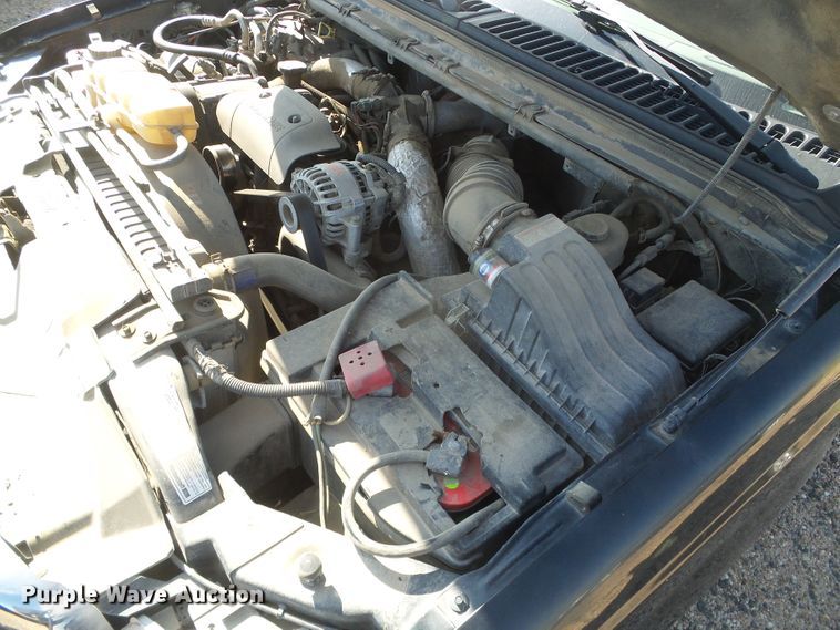 image for item DD0431 2000 Ford F250 Super Duty XLT  SuperCab flatbed pickup truck