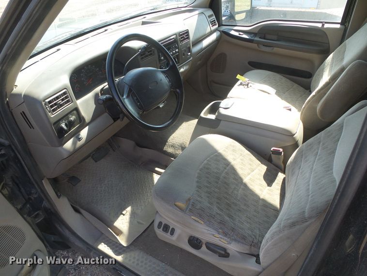 image for item DD0431 2000 Ford F250 Super Duty XLT  SuperCab flatbed pickup truck