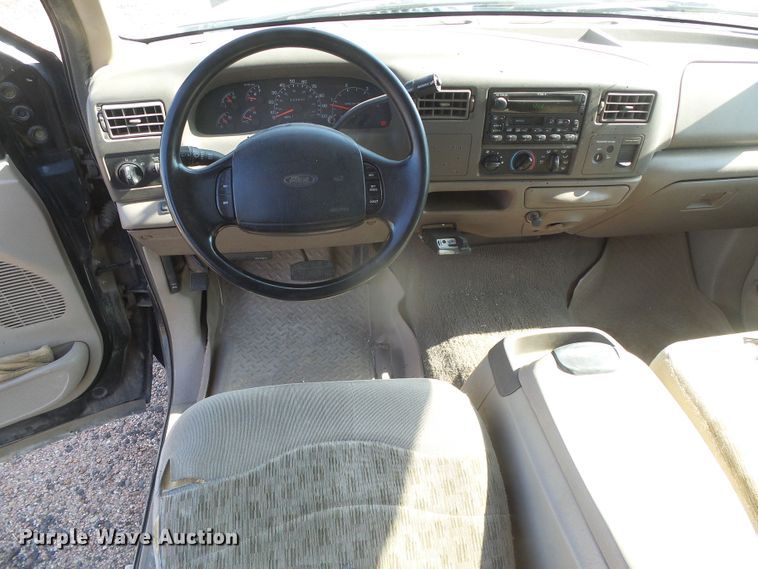 image for item DD0431 2000 Ford F250 Super Duty XLT  SuperCab flatbed pickup truck