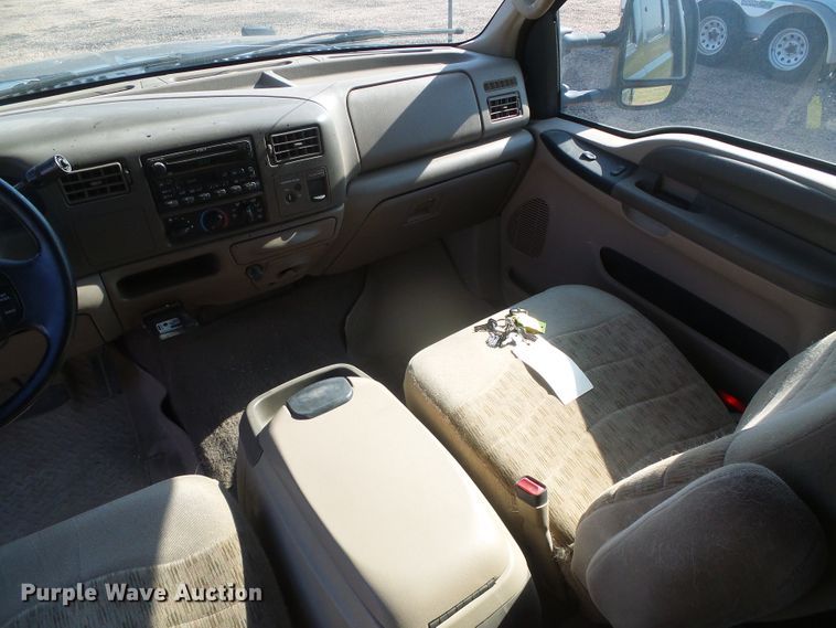 image for item DD0431 2000 Ford F250 Super Duty XLT  SuperCab flatbed pickup truck