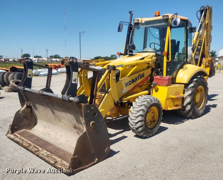 image for item DE6955 Komatsu WB140  backhoe