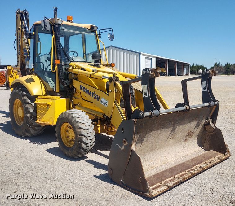 image for item DE6955 Komatsu WB140  backhoe