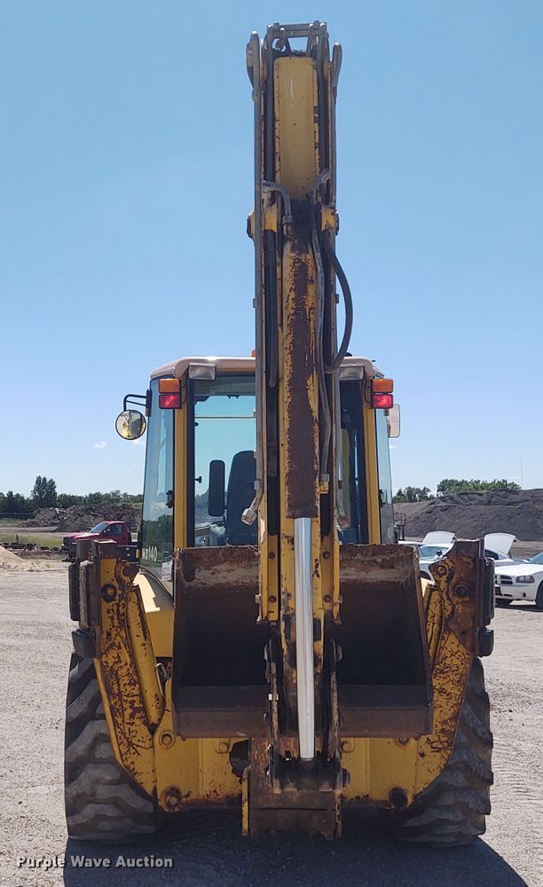 image for item DE6955 Komatsu WB140  backhoe