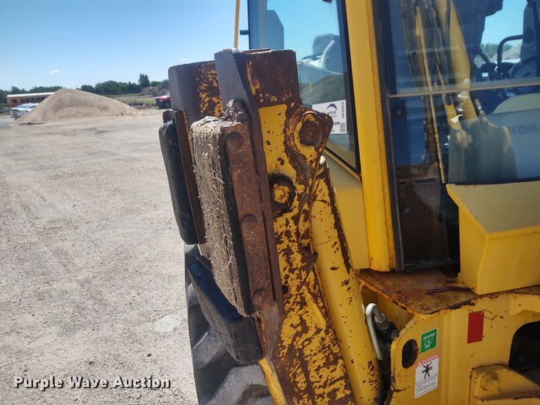 image for item DE6955 Komatsu WB140  backhoe