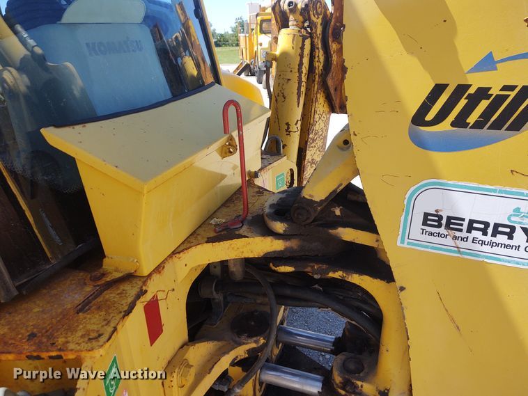 image for item DE6955 Komatsu WB140  backhoe