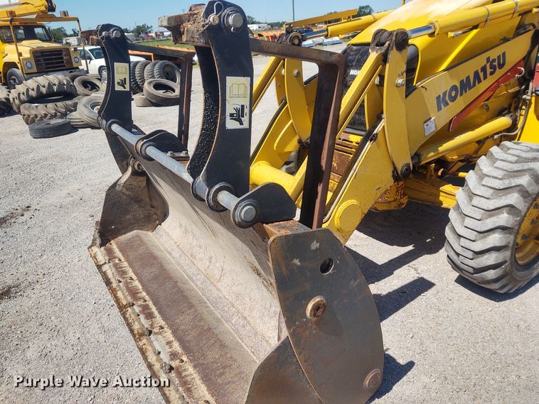 image for item DE6955 Komatsu WB140  backhoe