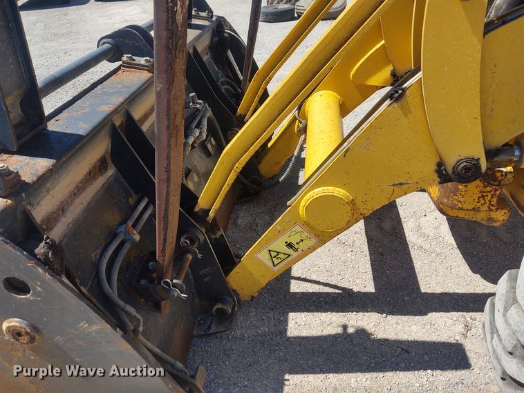 image for item DE6955 Komatsu WB140  backhoe