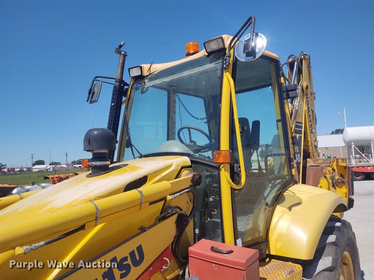 image for item DE6955 Komatsu WB140  backhoe