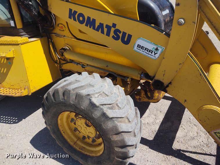 image for item DE6955 Komatsu WB140  backhoe