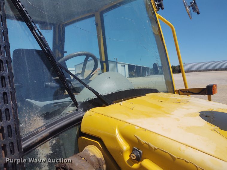 image for item DE6955 Komatsu WB140  backhoe