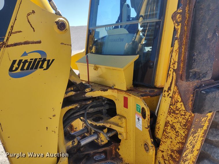 image for item DE6955 Komatsu WB140  backhoe