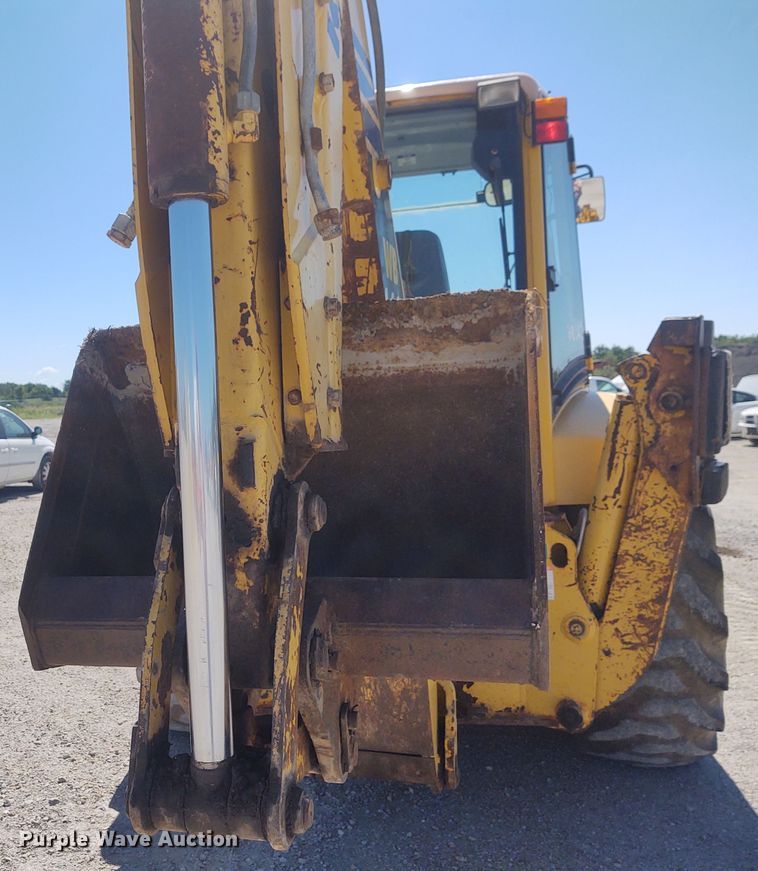 image for item DE6955 Komatsu WB140  backhoe