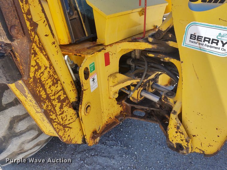 image for item DE6955 Komatsu WB140  backhoe