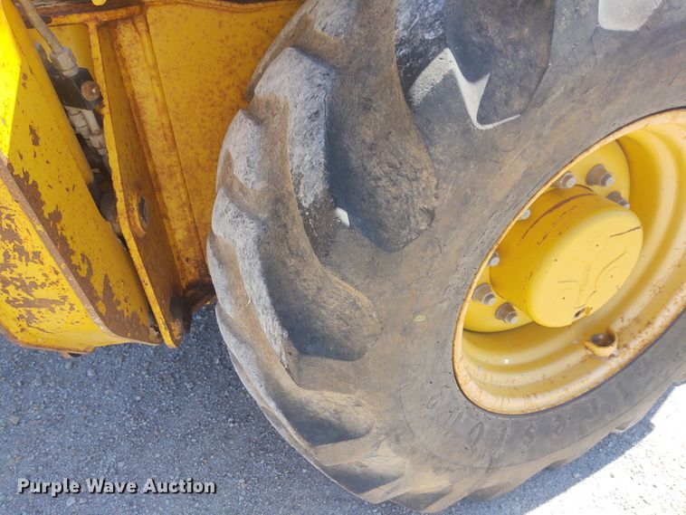 image for item DE6955 Komatsu WB140  backhoe