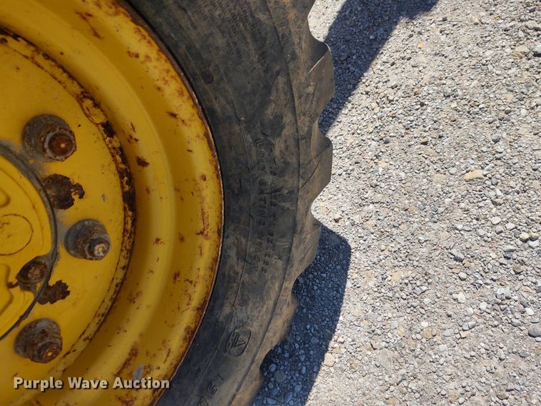 image for item DE6955 Komatsu WB140  backhoe