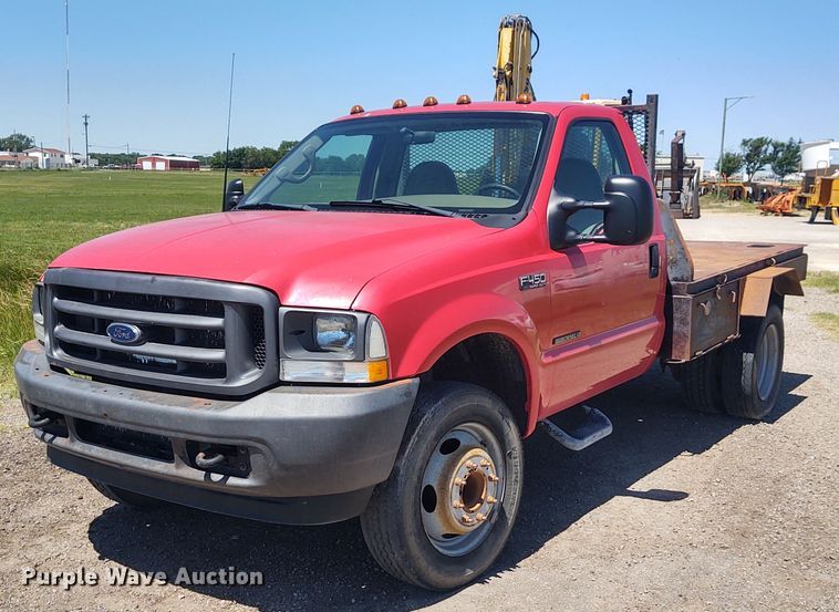 image for item DE6957 2002 Ford F450 Super Duty  flatbed truck
