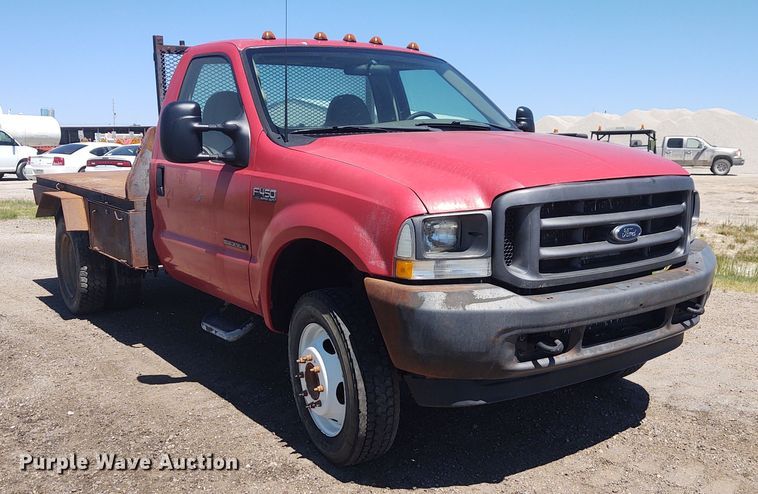 image for item DE6957 2002 Ford F450 Super Duty  flatbed truck