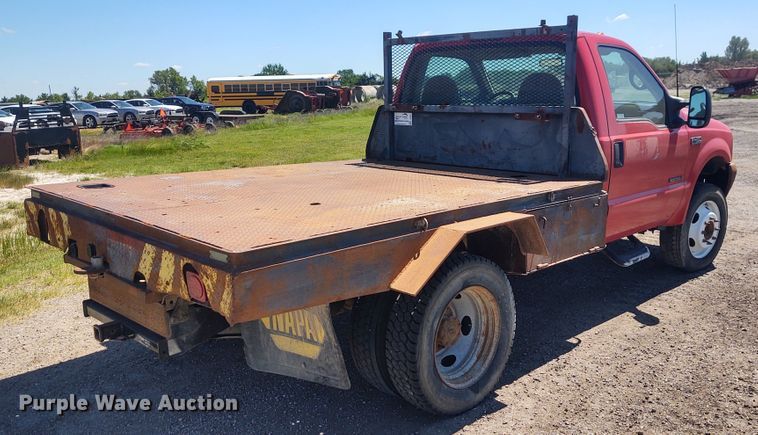 image for item DE6957 2002 Ford F450 Super Duty  flatbed truck