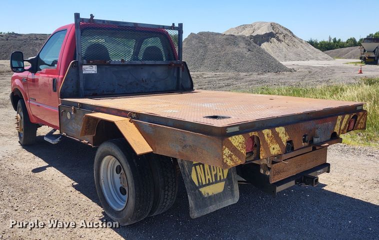 image for item DE6957 2002 Ford F450 Super Duty  flatbed truck